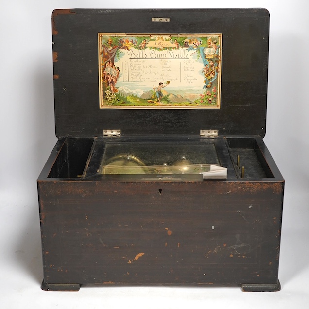 A 19th century Swiss cylinder, bells in sight eight air music box. Condition - poor with missing teeth to the comb, but working